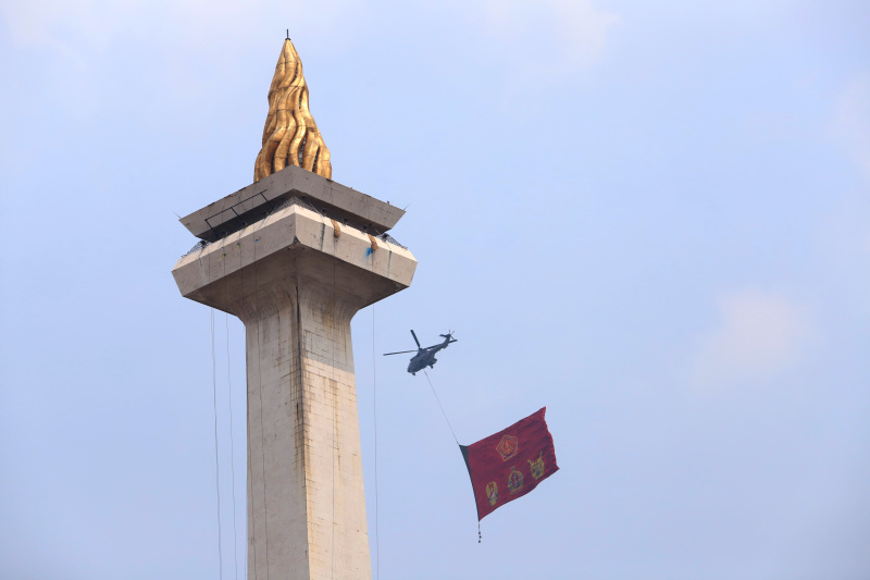 Presiden Jokowi hadiri perayaan puncak HUT ke-79 TNI di Monas (Ashar/SinPo.id)