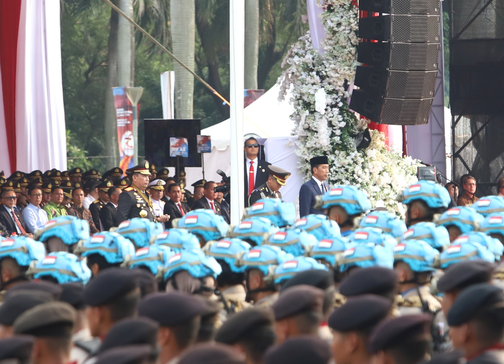 Presiden RI Jokowi menghadiri upacara HUT Bhayangkara ke-78 di Monas (Ashar/SinPo.id)