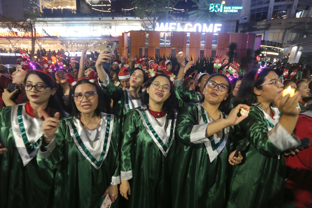 Rayakan Natal Christmast Carol Dengan 1,200 penyanyi (Ashar/SinPo.id)