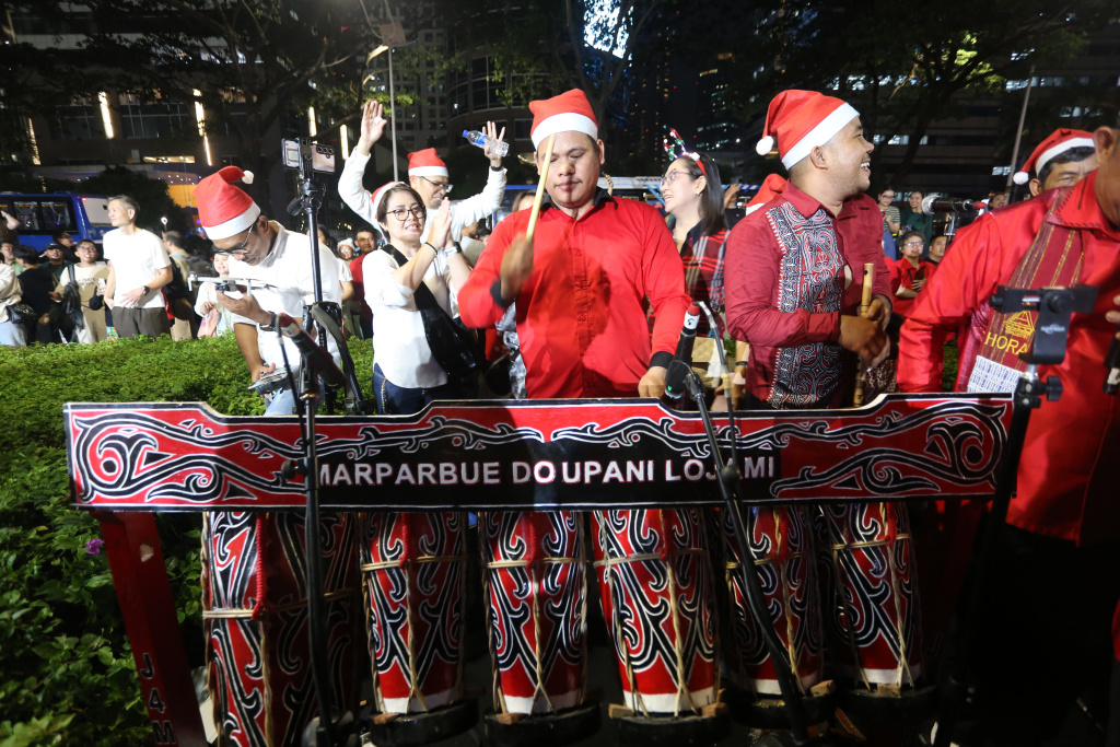 Rayakan Natal Christmast Carol Dengan 1,200 penyanyi (Ashar/SinPo.id)