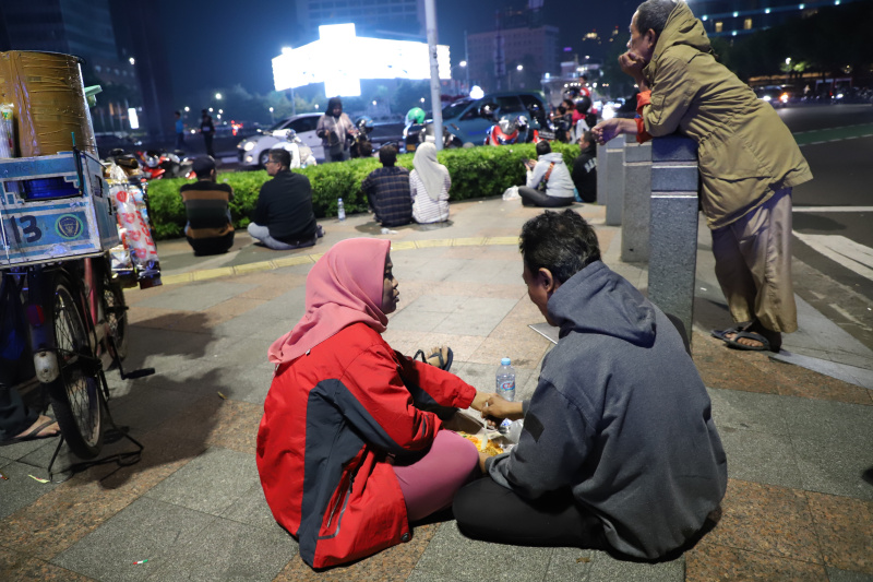 Ribuan warga berbondong-bondong menghadiri HUT Jakarta ke-497 di Monas (Ashar/SinPo.id)